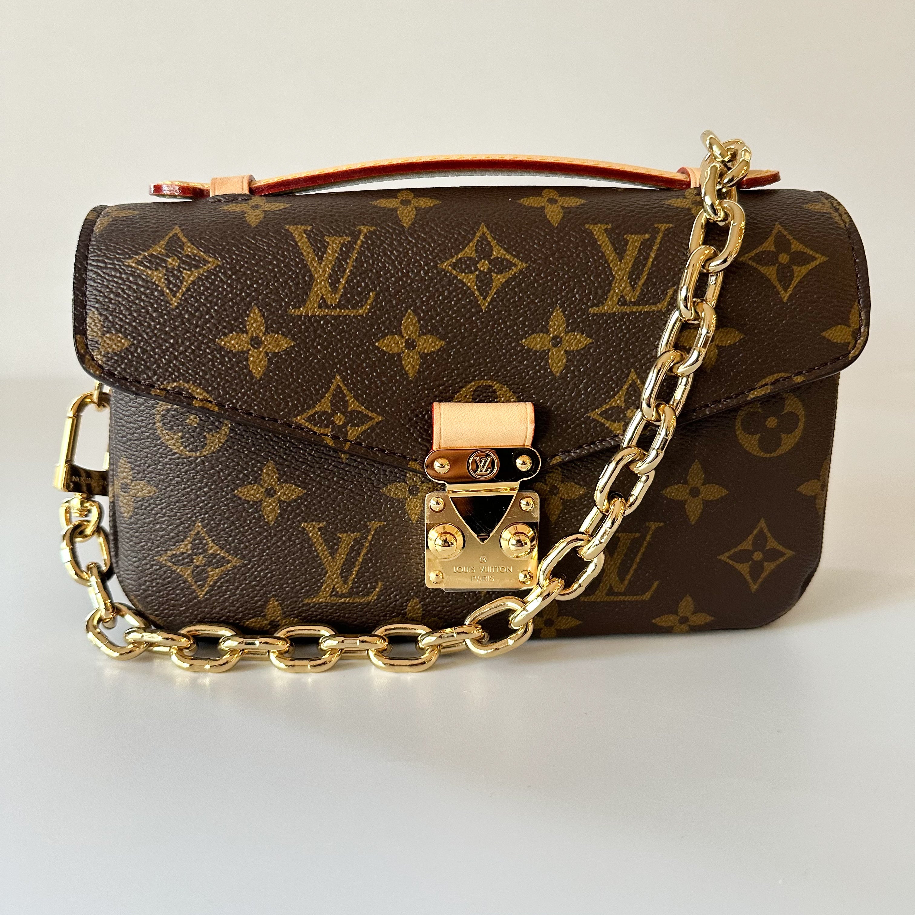 Louis Vuitton Monogram Pochette Metis in East West